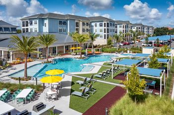 Two resort-style pools with cabanas